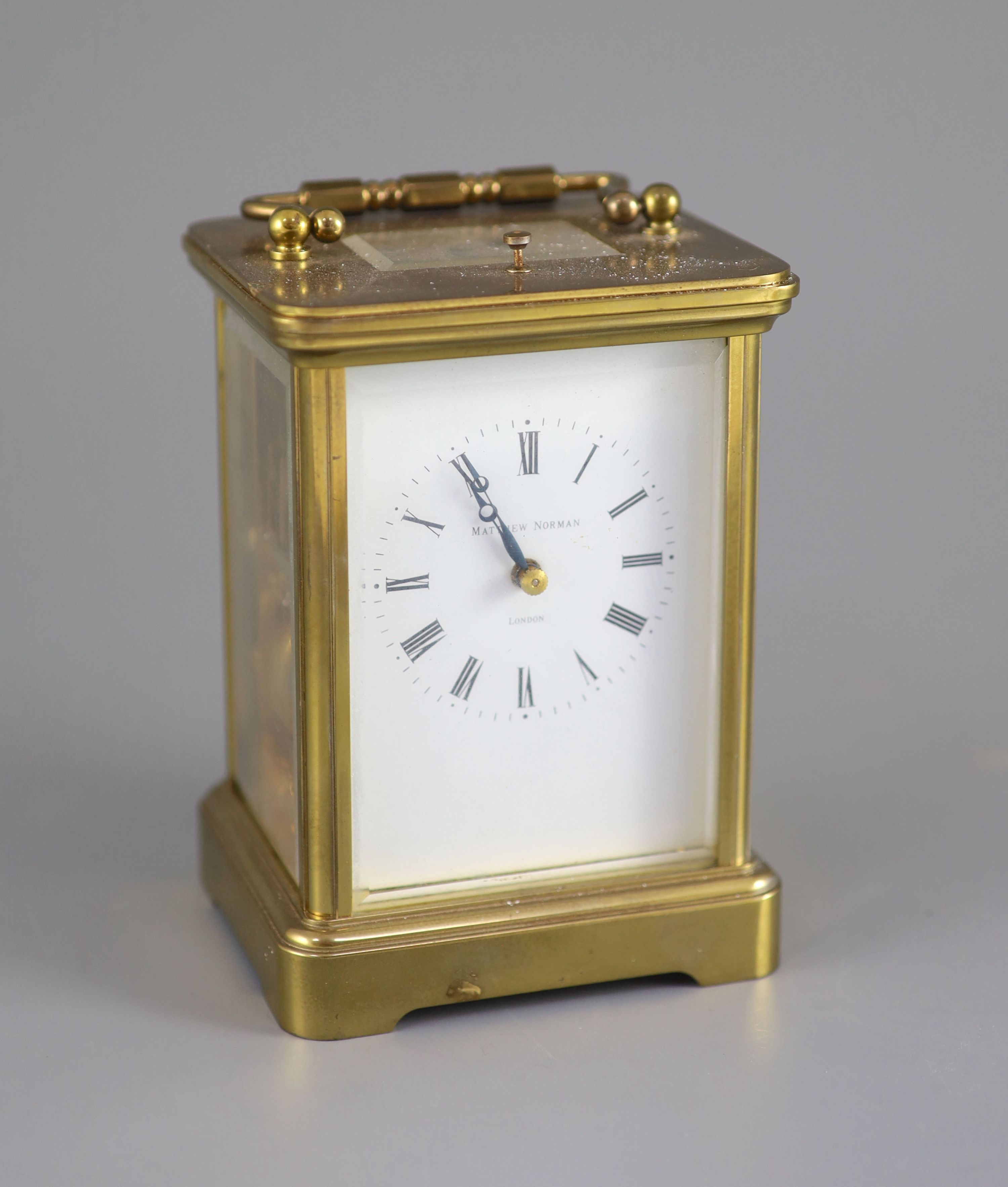 A large Swiss-made brass carriage clock, Matthew Norman, London, 20th century 14cm high.